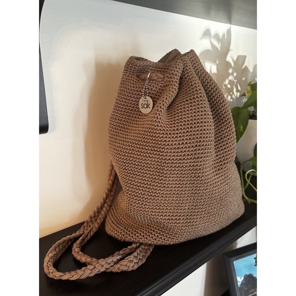 The Sak Drawstring Backpack Tan Crochet Boho Bucket Bag Timeless Hippy Chic